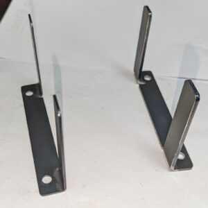 3-inch angle brackets, providing stability and support to the grilling setup.