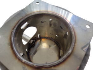 Revolutionary 11-hole burnpot for pellet grills creating a vortex of air for enhanced combustion