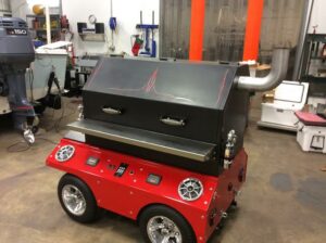 Pellet grill on wheels with built-in speakers, a mobile and entertainment-enhanced solution for outdoor grilling experiences