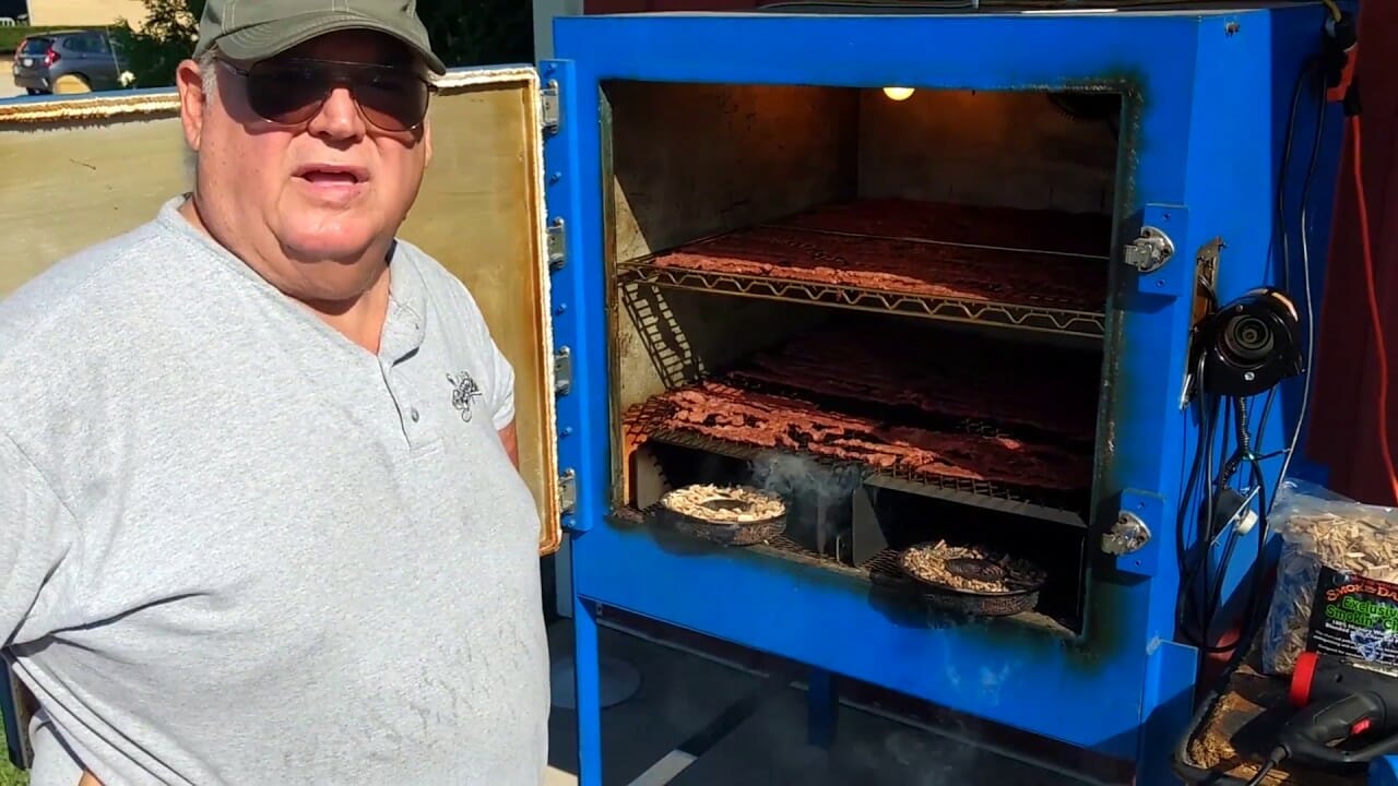 Dennis Stands Proud with Custom Smoker, Infusing Flavor into Beef Jerky